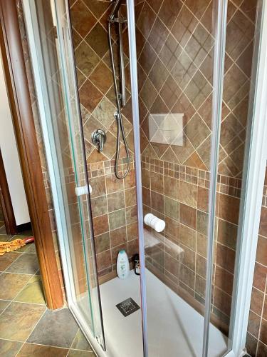 a shower with a glass door in a bathroom at Casa Vacanze Scilla in Scilla