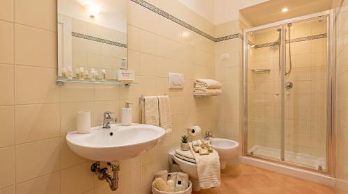 a bathroom with a sink and a shower at Casa della Marina - beach, seaview, wifi in Conca dei Marini