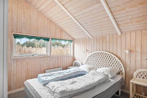 a bedroom with two beds and a window at LN1600-Hjorring-Indemarken-36 in Hjørring
