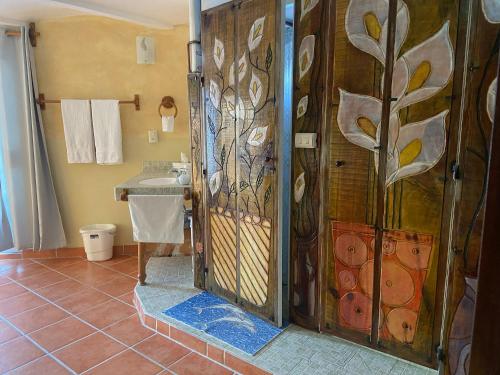 a bathroom with a shower and a sink at Casa Zuniga Extended Stay in Guanajuato