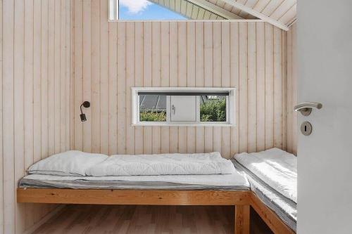 a bed in a room with a window at SJ301-Hejls-Teglgardsvej-3 in Hejls
