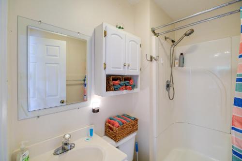 a bathroom with a sink and a shower and a mirror at Fire Pit & Floating Dock! Claytor Lake Hideout in Draper