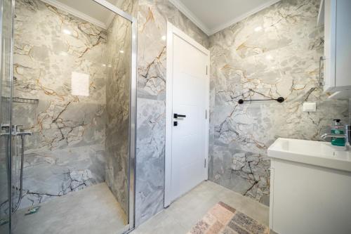 a bathroom with a shower and a sink at My house in Kaş in Kaş