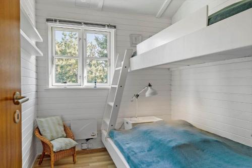 a childs room with a bunk bed and a staircase at LN1987-Hjorring-Havbruset-6 in Hjørring
