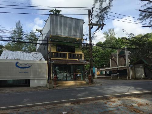 a building on the side of a street at The Naithorn Condo Unit 401 in Nai Thon Beach