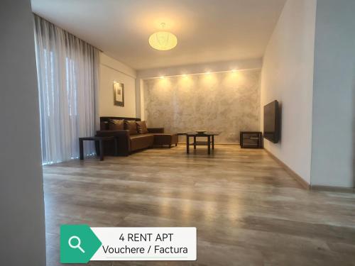 a living room with a couch and a table at 4 RENT-Apt 3 camere Tichete,Factură in Constanţa