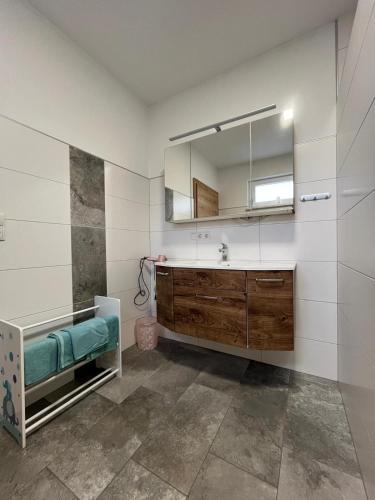 a bathroom with a sink and a mirror at Panoramablick Zirbitzkogel in Perchau am Sattel