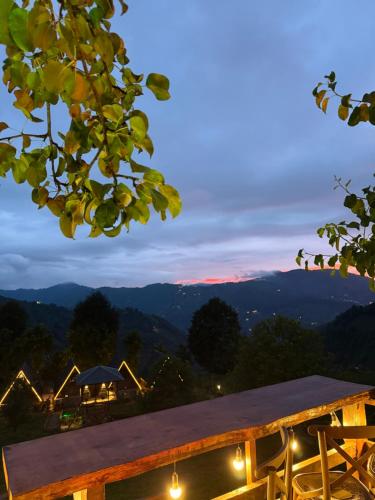 a view of the mountains at night at RİZE SERENİTY BUNGALOV in Rize