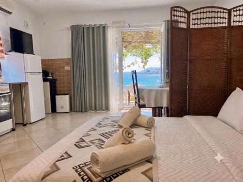 a living room with a view of the ocean at Apartments Djurovic in Kotor