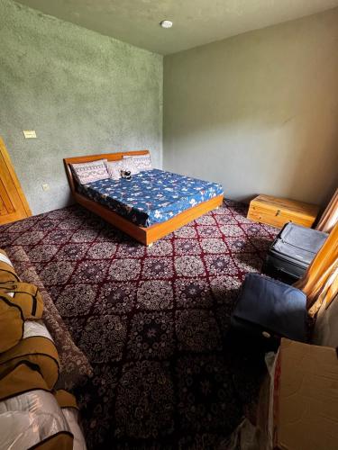 a bedroom with a bed in a room at Marvoi resort in Hunza Valley