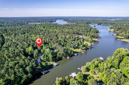 an aerial view of a river with a red marker at The Sinclair House Private Lake Retreat in Milledgeville