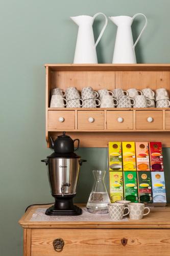 a wooden cabinet with a mixer on a table at Langtaufererhof in Melago