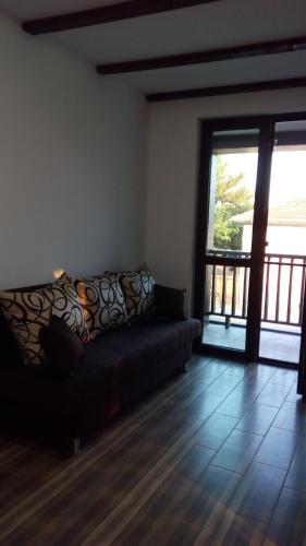 Χώρος καθιστικού στο Guesthouse Orlovo