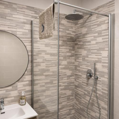 a bathroom with a shower and a sink at Bolle Apartment Monterosso al mare in Monterosso al Mare