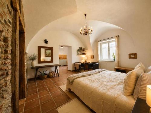 a bedroom with a large bed in a room at Holiday Home up to 7 Guests in Fürstenfeld