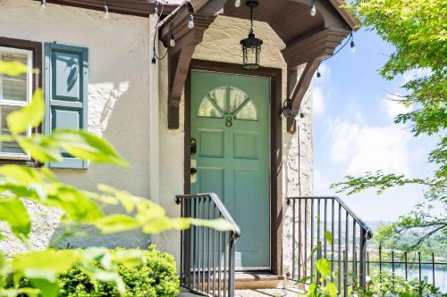 a front door of a house with a green door at Historic Riverview Inn Eight in Chattanooga