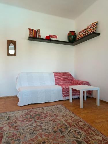 a living room with a couch and a table at Solaris in Ostrava