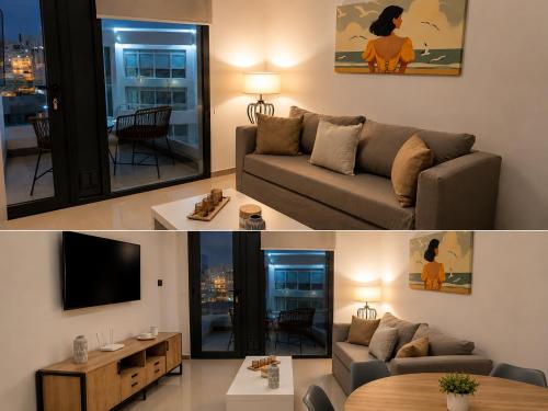 a living room with a couch and a tv at House Vista Azul in Puerto Madryn