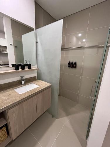 a bathroom with a shower and a sink at Ola del Mar in Gaira