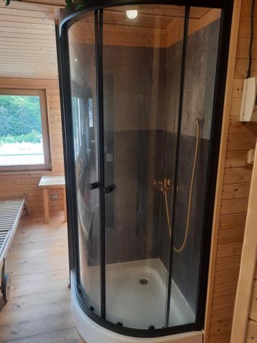 a shower inside of a tiny house at Fantasy in Karlovy Vary