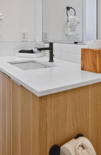 a kitchen with a sink and a counter top at Sonoran Oasis with Pool, Spa & BBQ Area in Phoenix