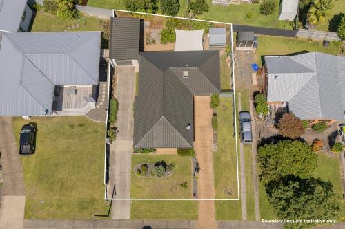 an overhead view of a row of houses with roofs at Family Friendly-Whitianga in Whitianga