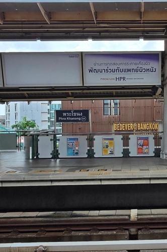 a subway station with a platform with a train station at StayAt Bedever Bangkok Hotel in Bangkok