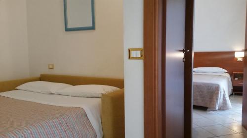 Cama o camas de una habitación en Residence Special