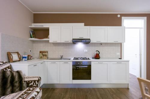 Cuisine ou kitchenette dans l'établissement Apartments da Edvige