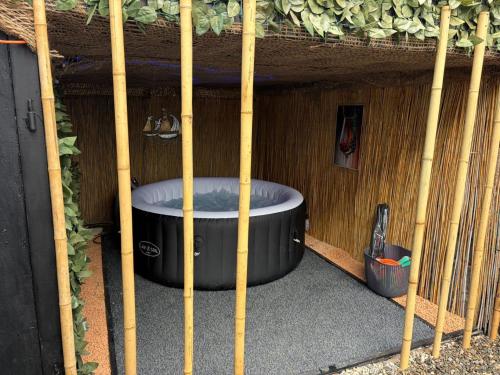 a hot tub sitting inside of a building at Vila Zeus in Cristian