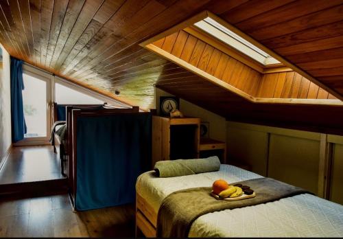 a bedroom with a bed with bananas and fruit on it at Maison de la mer in Hendaye
