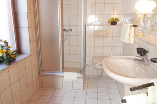 Koupelna v ubytování Hotel Auf Dem Langenhof Wunstorf