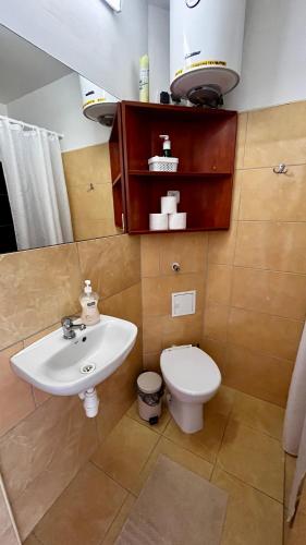 a bathroom with a sink and a toilet at NASZE BIAŁE pokój 2 osobowy in Okuninka