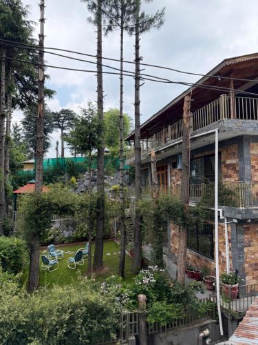 a house with a yard in front of it at Cascade garden villa in Ayubia