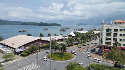 an aerial view of a town next to a body of water at Peter Holiday Home @ Marina Court Condo in Kota Kinabalu