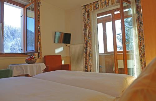 Postel nebo postele na pokoji v ubytování Hotel - Restaurant Gosauerhof
