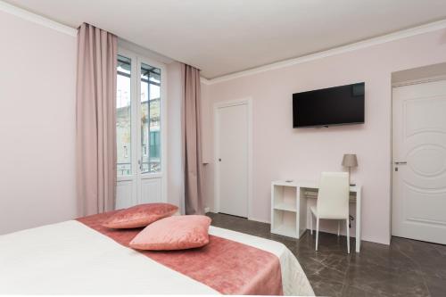 Voodi või voodid majutusasutuse Amendola Rooms toas