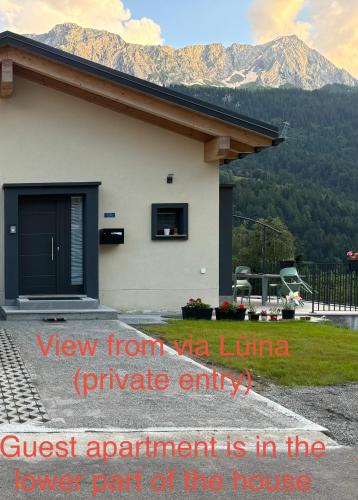 a guest apartment is in the lower part of a house at Mountain spot in a cozy nest in Airolo