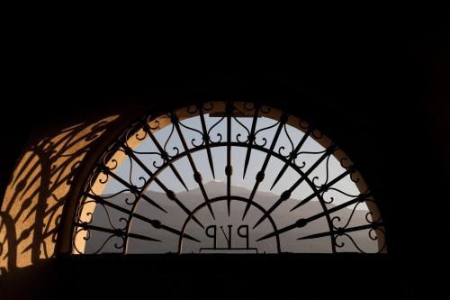 a window with a view of the sky through it at Feudo Vagliasindi -Wine Experience- in Randazzo