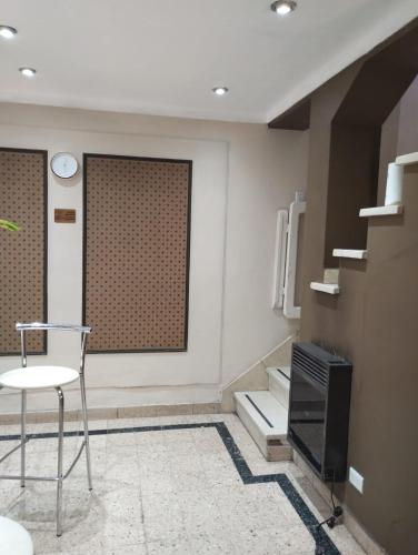 a room with a table and a chair and a window at Casa LYON in Barraquero
