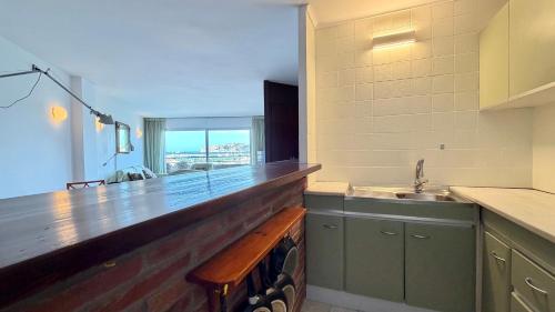 a kitchen with a counter and a sink and a counter top at MEDES PARK II 4-3 in L'Estartit