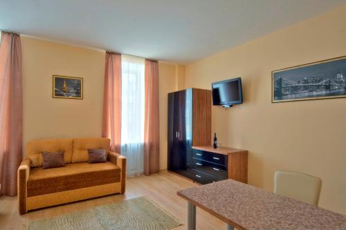 TV a/nebo společenská místnost v ubytování Sunday Apart Hotel