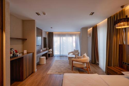 Lova arba lovos apgyvendinimo įstaigoje Dumer Butik Hotel
