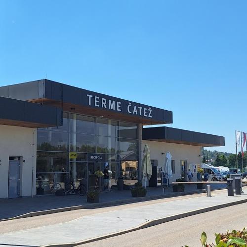 a store with a sign that reads centre cafe at La Verena apartment Terme Čatež in Čatež ob Savi