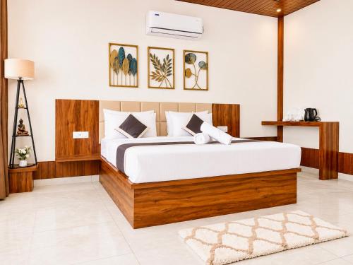 a bedroom with a bed in a room at SS Luxury Comforts - Twin Sharing in Chikmagalūr