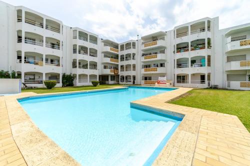 OuraPool Apartment - T by HelloVacations