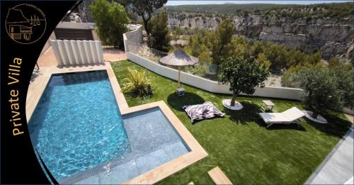 an overhead view of a swimming pool in a yard at Cassis Lodges in Cassis