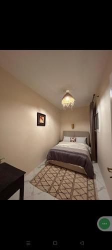 a bedroom with a large bed in a room at Appart Dakhla Cool in Dakhla