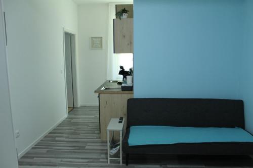 a living room with a bed and a kitchen at Royal Racing Suite Top 2 near Red Bull Ring in Judenburg