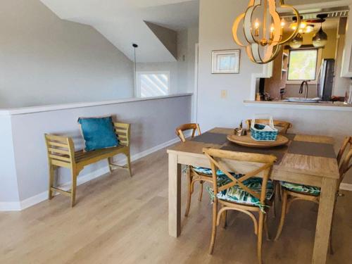 a dining room with a table and chairs at 1235 Creekwatch Villa in Seabrook Island